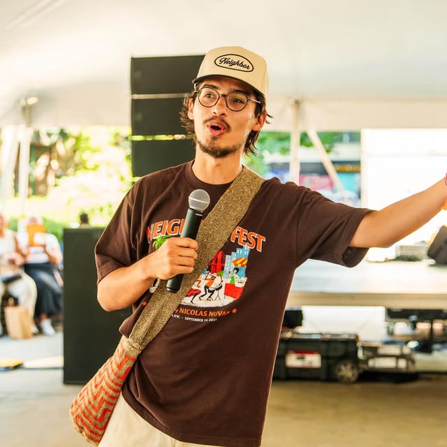 On the mic at Neighbor Fest